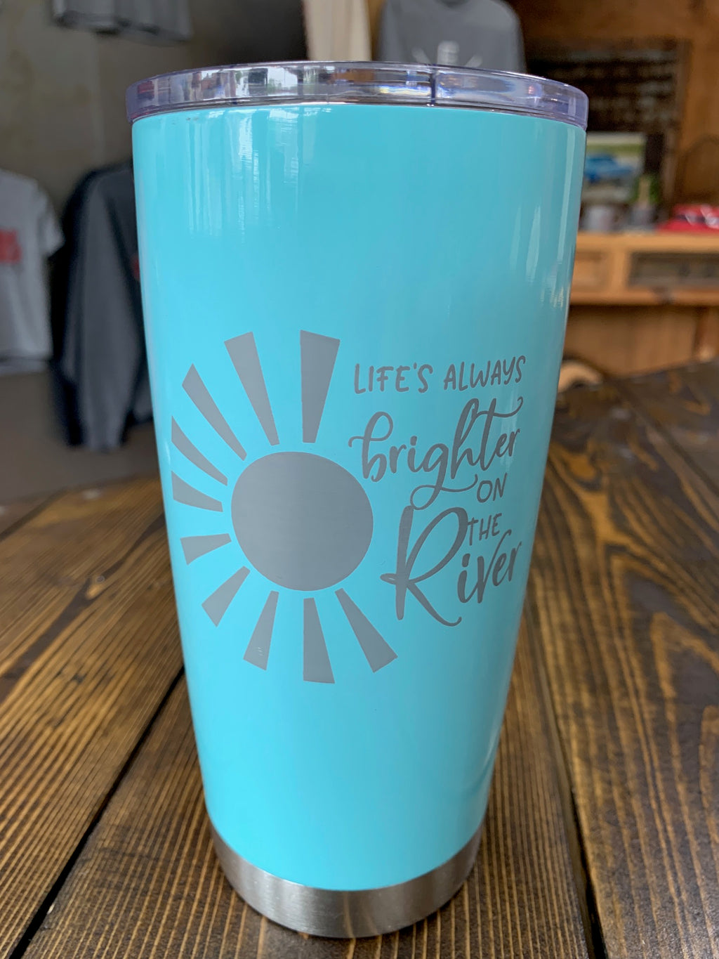 20 oz insulated cup in Light Blue with "Life is brighter at the River"